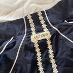 Windbreaker med blomster detaljer