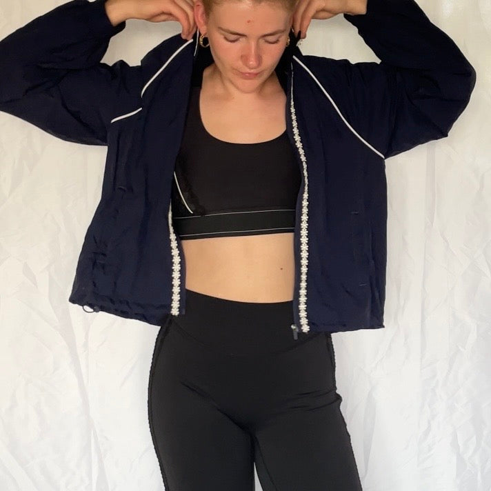 Windbreaker med blomster detaljer