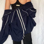 Windbreaker med blomster detaljer