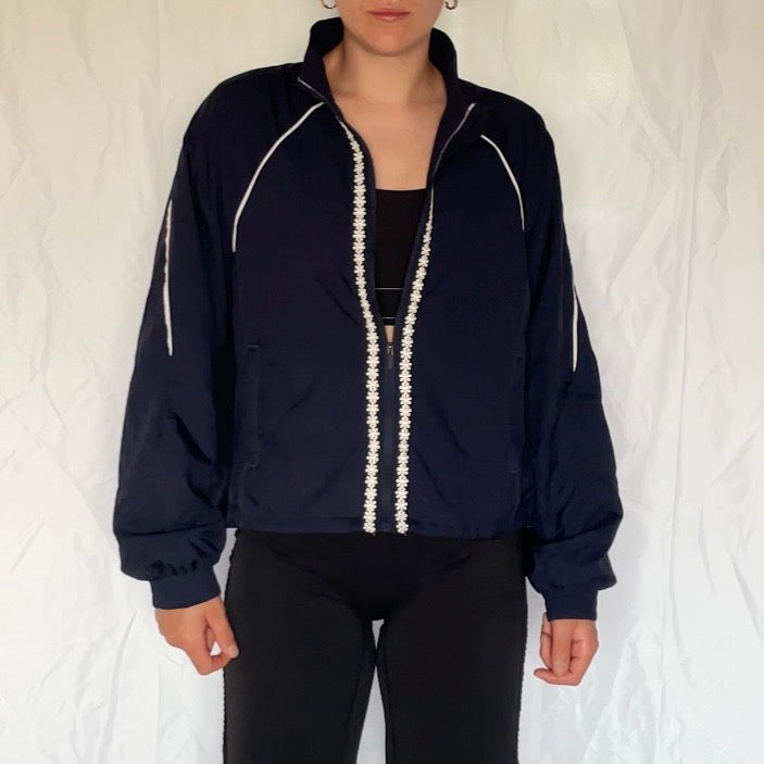 Windbreaker med blomster detaljer