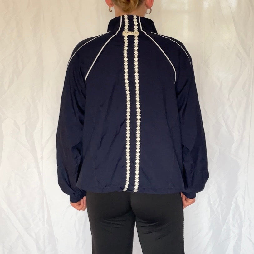 Windbreaker med blomster detaljer